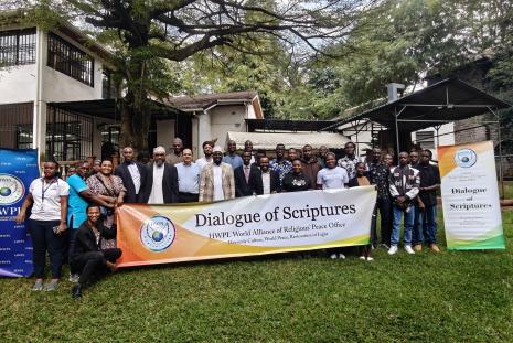 Dr Hassan Kinyua posing for a photo with the attendees
