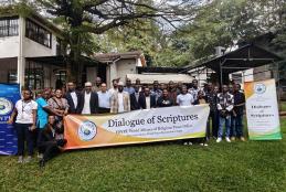 Dr Hassan Kinyua posing for a photo with the attendees