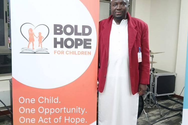 Dr. Hassan Omari Kinyua posing for a photo