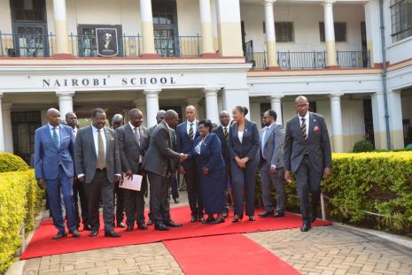 Mrs Rebecca Murigu Lecturer at the department, and also the Chairperson Nairobi School Board of Management, receiving the President Dr. William Ruto at Nairobi School