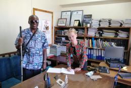 Dr Reginald Oduor (left) , the convener of the talk, and Dr. Dannica Fleuß (right), signing the guest book in the department of Philosophy and Religious Studies