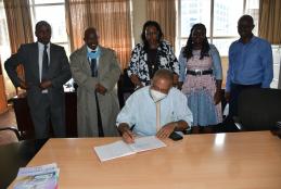 Prof. Afe Adogame signing the visitors book